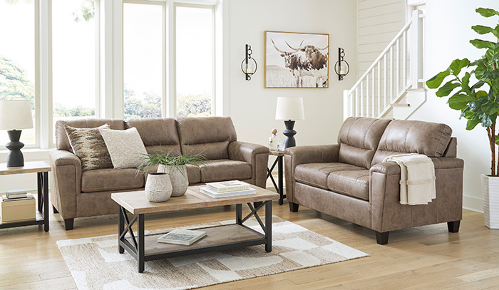 Brown Leather Sofa and Love Seat in a bright modern home